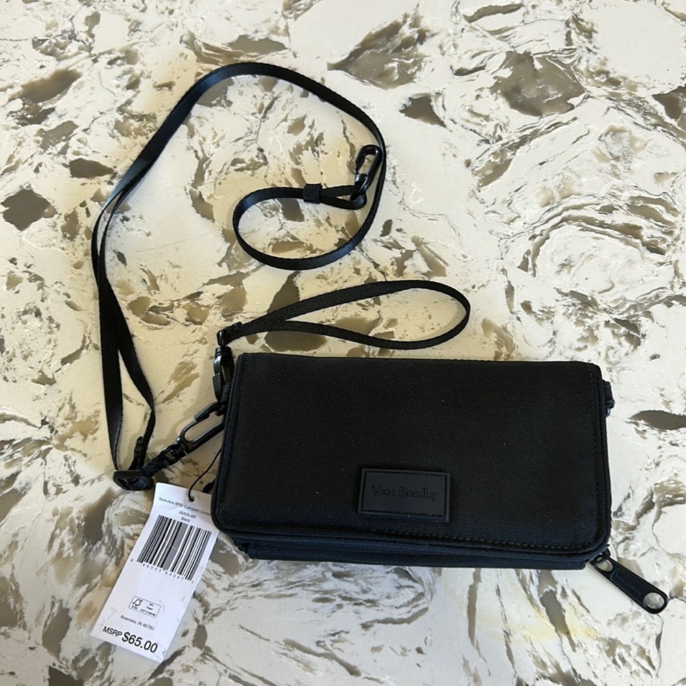 NWT Vera Bradley ReActive compact cross body wallet.